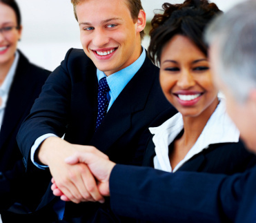happy employees shaking hands